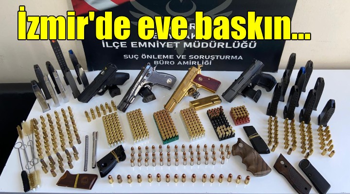 İzmir'de şüpheli eve baskın: 4 tabanca, çok sayıda mermi ele geçirildi